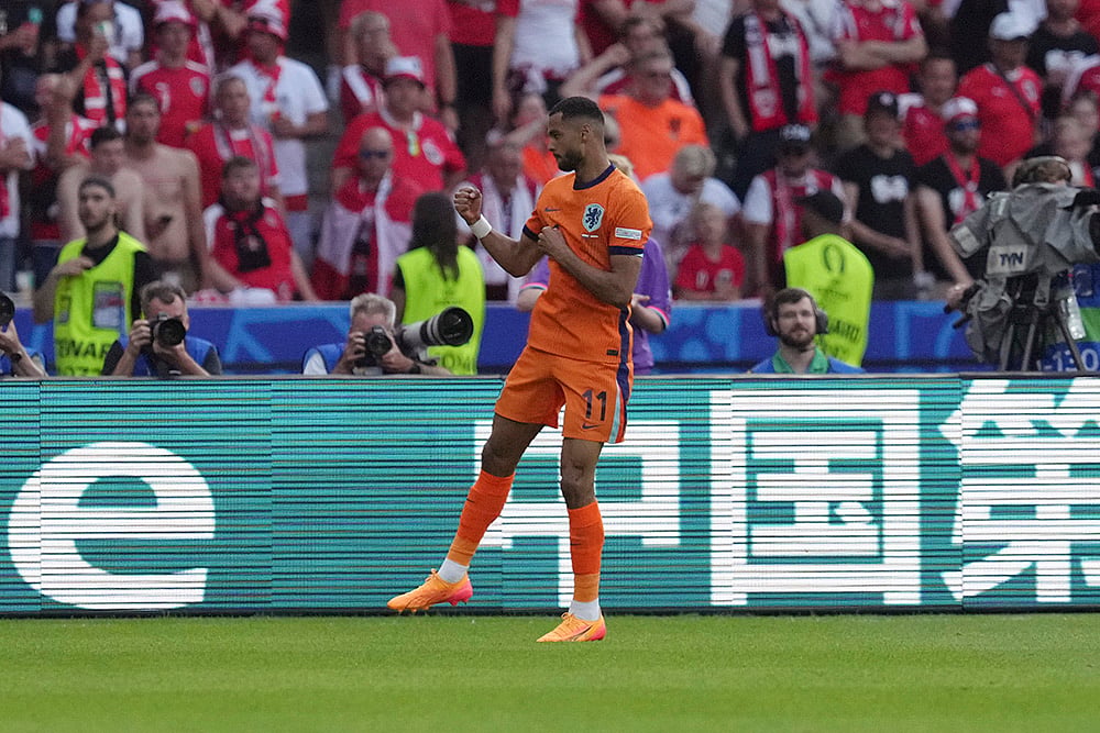 | Photo: AP/Sunday Alamba : Cody Gakpo celebrates a goal 